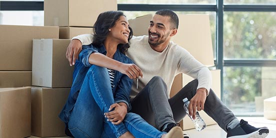 young couple in new home