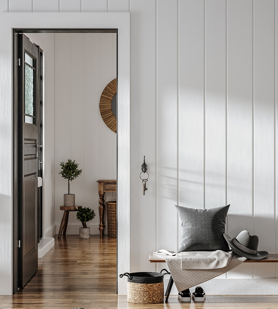 Modern home entryway with bench, woven basket, and hallway with natural light